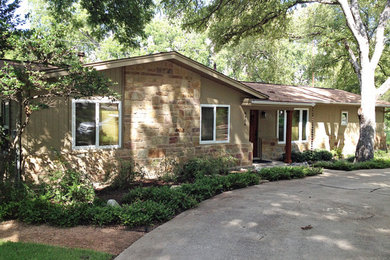 Example of an arts and crafts exterior home design in Austin