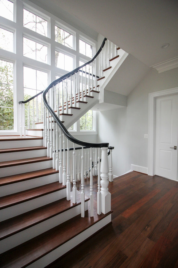 Powerful Impression by Floating Staircase in Suburban Foyer