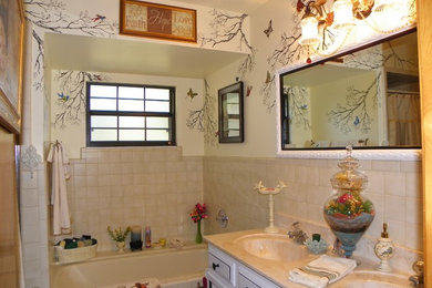 Example of a mid-sized eclectic home design design in Phoenix