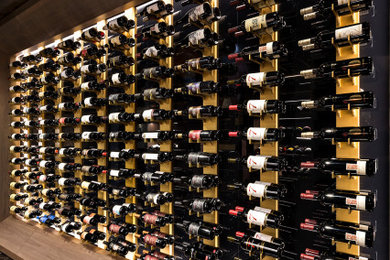 Example of a large trendy wine cellar design in Vancouver
