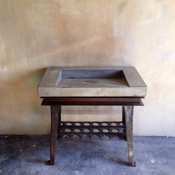 Concrete slot drain sink with repurposed industrial base