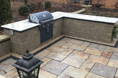 Patio - brick patio idea in Chicago