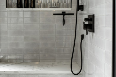 Large minimalist master white tile and ceramic tile porcelain tile, gray floor and vaulted ceiling bathroom photo in Atlanta with shaker cabinets, black cabinets, a one-piece toilet, white walls, an undermount sink, a hinged shower door and a built-in vanity