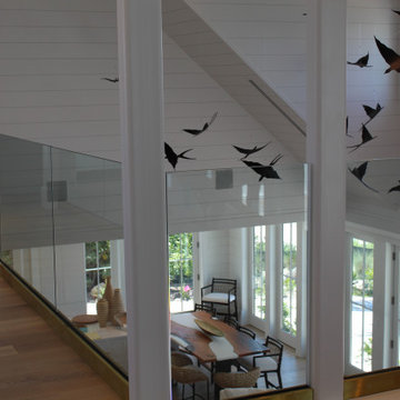 Glass Balustrade with Aluminum Base Rail Finished with Satin Brass Cladding