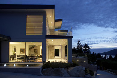 Inspiration for a modern exterior in Vancouver with stone veneer.