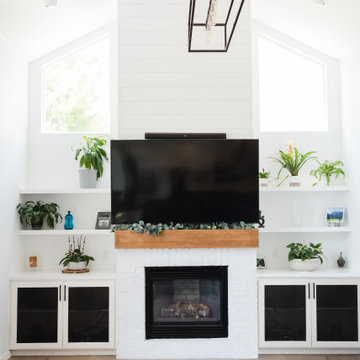 Rock Kitchen, Flooring and Custom Fireplace and Shelving Remodel