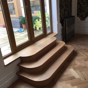 Steps down into the split level lounge in the same house