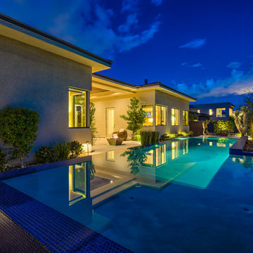 Raised Rim Flow Pool with Custom Fire/Water Feature