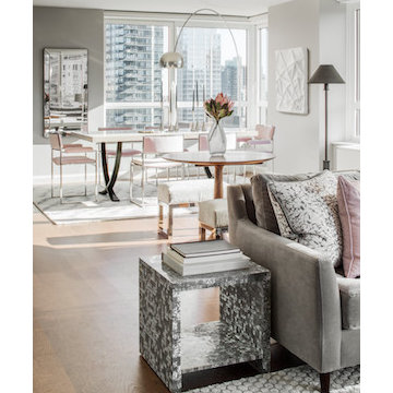 Area rugs differentiate the different sections of the common area