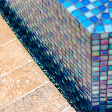 Custom Tile For Swim Spa With Custom Fire Bowls and Outdoor Kitchen in Cooper Ci