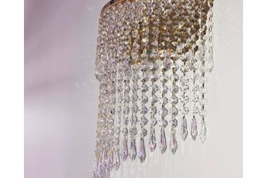 Chandelier wall sconce for a private residence