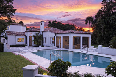 Tuscan pool photo in Miami