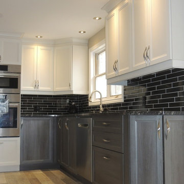 Two colors kitchen with massive island