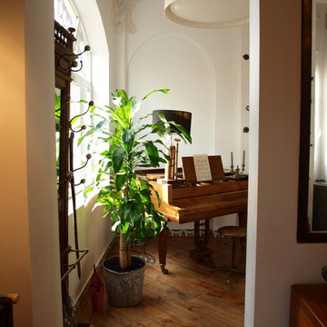 Obra y decoración salón y hall vivienda unifamiliar en madrid