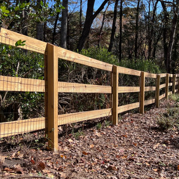 Three rail fence with wire