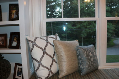Living room library - transitional living room library idea in San Diego