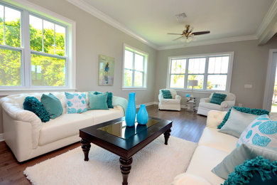 Example of a beach style living room design in Tampa