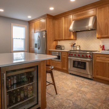 Transitional Warm Wood Farmhouse Kitchen Remodel | Quartz Countertops & Modern L