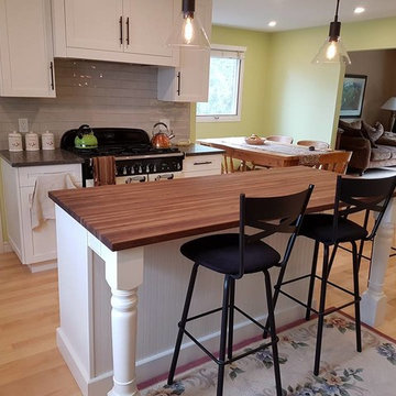 Charming bright white kitchen with adjoining bathroom