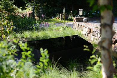 Inspiration for a mid-sized transitional drought-tolerant and full sun front yard stone garden path in Boston.