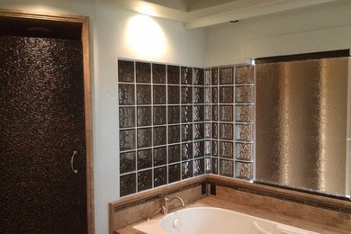 Example of a mid-sized transitional master beige tile and ceramic tile ceramic tile and beige floor bathroom design in Phoenix with white walls and a hinged shower door