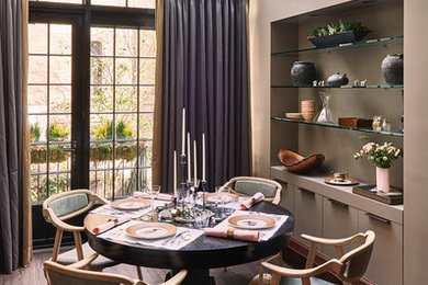 Small transitional dark wood floor and brown floor enclosed dining room photo in New York with beige walls and no fireplace