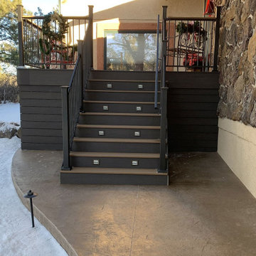 New composite deck with steel deck railing, closed deck stairs, animal control f