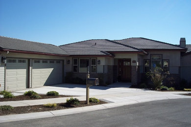 Example of a mid-sized minimalist beige one-story mixed siding exterior home design in San Luis Obispo