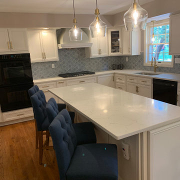 cabinet reface--white with quartz and tile splash, also removal of bulkhead