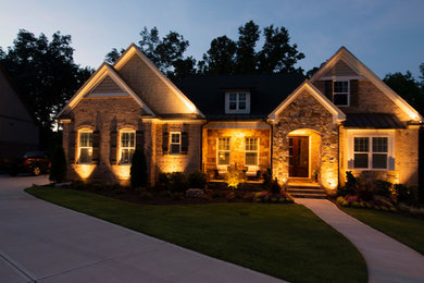 Example of a transitional home design design in Atlanta