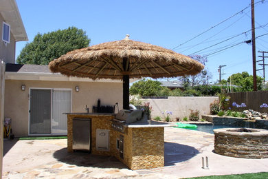 Island style patio photo in San Diego