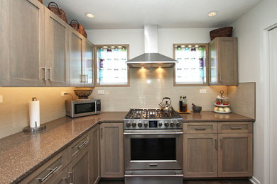 Inspiration for a mid-sized contemporary l-shaped ceramic tile and brown floor open concept kitchen remodel in Other with recessed-panel cabinets, light wood cabinets, granite countertops, beige backsplash, subway tile backsplash, stainless steel appliances, no island and an undermount sink