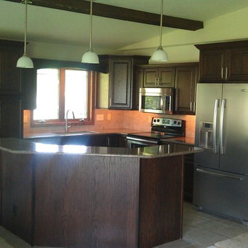 Omega Cabinetry, Brookside door, Oak wood, Chestnut stain.