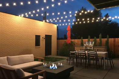Patio - contemporary patio idea in Denver