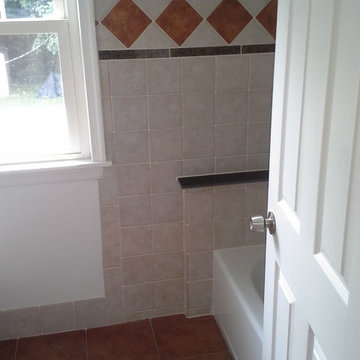 Master and main bathroom with imported Italian porcelin and granite tiles.