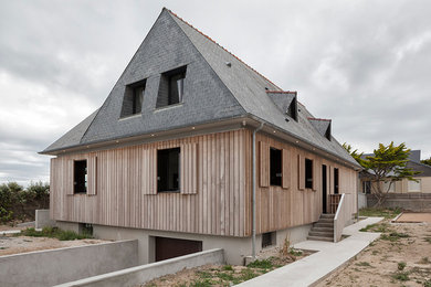 Idée de décoration pour une façade de maison design.