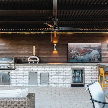 Contemporary Family Living with Outdoor Kitchen and Fireplace
