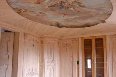 Example of a transitional dining room design in Other
