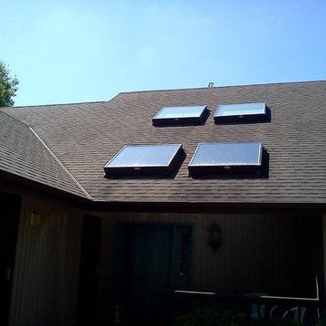 Facelift to modernize house & expand over garage