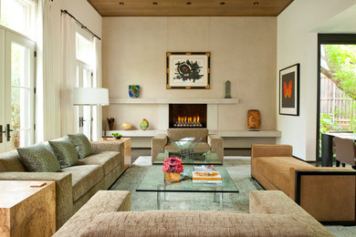 This is an example of a large contemporary formal open concept living room in Dallas with beige walls, a standard fireplace, no tv and a concrete fireplace surround.