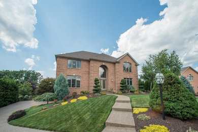 Example of an exterior home design in Other