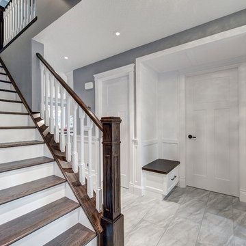 Open plan front entry with bench seating, also showing new oak and mdf staircase
