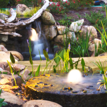 LED Lighting shows off the Waterfall and bubbling millstone feature in Knoxville