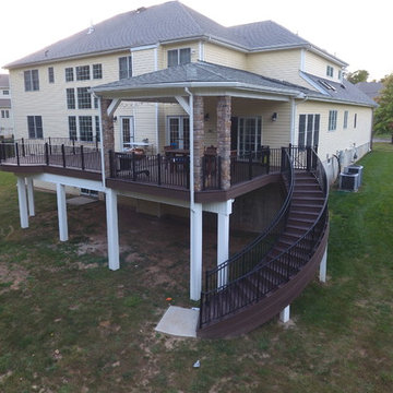 State of the Art Trex Deck, Curved Stairs, Hip-Roof