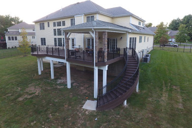 State of the Art Trex Deck, Curved Stairs, Hip-Roof