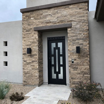 Visionmakers Custom Stone & Steel Doors