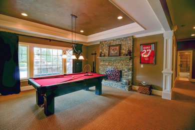 Living room - small modern enclosed carpeted and beige floor living room idea in Atlanta with a music area, beige walls, a standard fireplace, a stone fireplace and a concealed tv