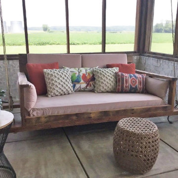 Cozy porch swing bed with Sunbrella cushions