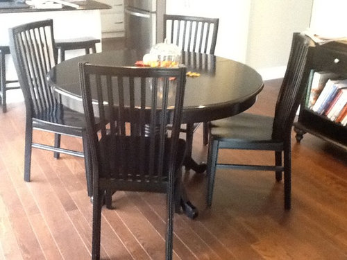 oval rug under kitchen table