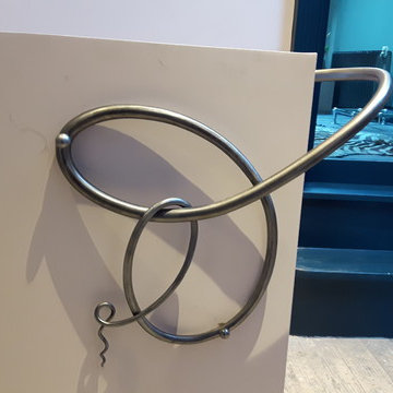 Hot forged interior handrail
